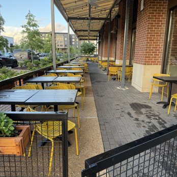 Tupelo Honey Southern Kitchen & Bar - Outdoor dining - New American Near Me - Huntsville, Alabama Tupelo Honey Southern Kitchen & Bar - Outdoor dining - New American Near Me - Huntsville, Alabama