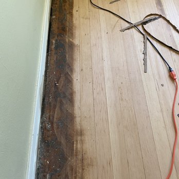 Altered State Restorations - The floors after the initial mastic removal and sanding, part way through the project. - Flooring Near Me