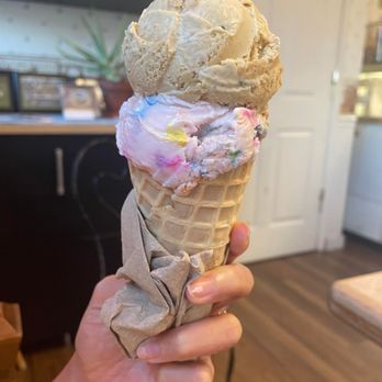 Sprinkles Ice Cream Shoppe - a hand holding a cone of ice cream - Ice Cream & Frozen Yogurt Near Me - Elkins Park, Pennsylvania Sprinkles Ice Cream Shoppe - a hand holding a cone of ice cream - Ice Cream & Frozen Yogurt Near Me - Elkins Park, Pennsylvania