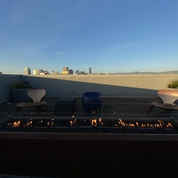 Modera Jack London Square - View of Downtown by the fireplace - Apartments Near Me - Oakland, California Modera Jack London Square - View of Downtown by the fireplace - Apartments Near Me - Oakland, California