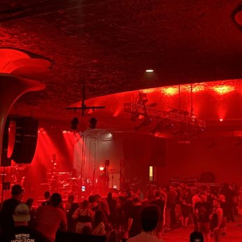 The Showbox - a large crowd of people dancing - Music Venues Near Me - Seattle, Washington The Showbox - a large crowd of people dancing - Music Venues Near Me - Seattle, Washington