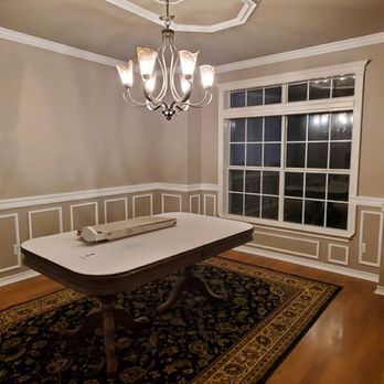 B&F Renovations - a dining room with a chandelier - General Contractors Near Me B&F Renovations - a dining room with a chandelier - General Contractors Near Me
