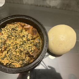 Goat egusi and fufu (pounded yams) Goat egusi and fufu (pounded yams)