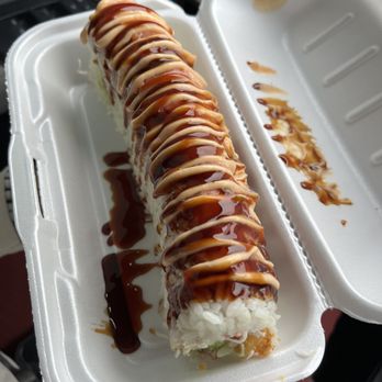 Kinoy Hibachi Express - a sushi roll in a styrofoam container - Sushi Bars Near Me - Ozark, Arkansas