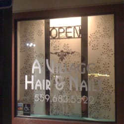 A Village Hair & Nails - Full service salon offering haircuts, colors, perms, nail services, spa pedicures.