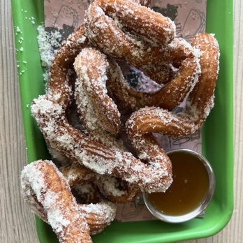 Mister Oso - Birthday churros given to a friend celebrating a birthday. - Latin American Near Me - Denver, Colorado