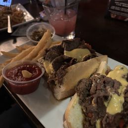Steak sandwich and fries Steak sandwich and fries