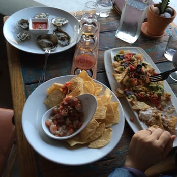 Fish Gaucho - I did like the water bottle...ha. Apps, entree to come. Also there was this annoying bee bothering us, but at least it paid us a visit. - Mexican Near Me - Paso Robles, California
