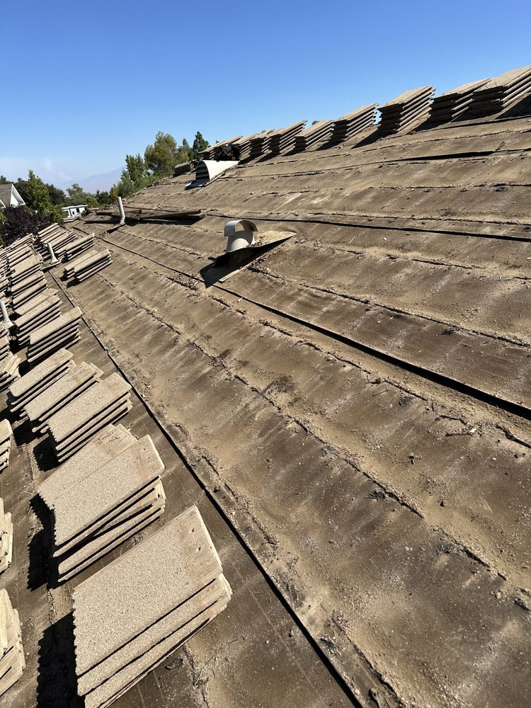 Slide of All out Roofing and Construction