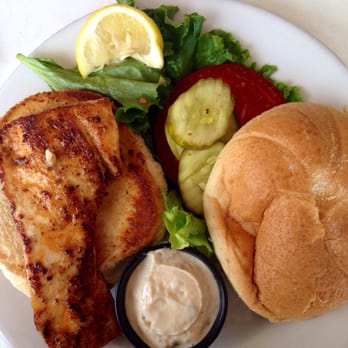 Shuckers - Blackened mahi sandwich. - Seafood Near Me - Jensen Beach, Florida Shuckers - Blackened mahi sandwich. - Seafood Near Me - Jensen Beach, Florida
