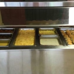 Magnolia Cafe - Thin precooked bacon, sausage in a maple syrup, thick grits, frozen biscuits, powdered eggs, hash brown casserole