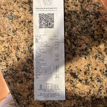 Sergio's Restaurant - a receipt on a counter - Cuban Near Me - Miami, Florida Sergio's Restaurant - a receipt on a counter - Cuban Near Me - Miami, Florida