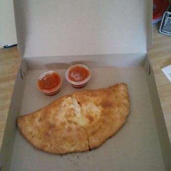 Uptown Pizza - The small calzone is BIG! - Pizza Near Me - Delray Beach, Florida