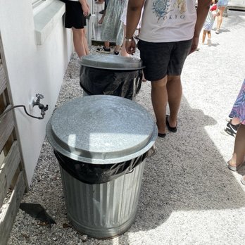 North Shore Cafe - Garbage can without handles. Customers have to throw their garbage way as no employees come around to bus the table. - Coffee & Tea Near Me - Anna Maria, Florida North Shore Cafe - Garbage can without handles. Customers have to throw their garbage way as no employees come around to bus the table. - Coffee & Tea Near Me - Anna Maria, Florida