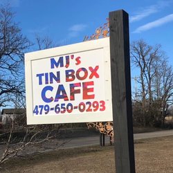 MJ’s Tinbox Cafe - This is the sign you will see on the right side of the road, this is where we are !
