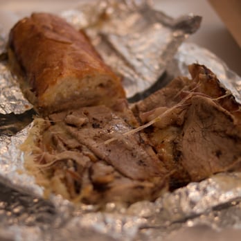 Olive's - Ancho chili rubbed steak with melted jalapeño jack and grilled onions on a white baguette - Sandwiches Near Me - New York, New York Olive's - Ancho chili rubbed steak with melted jalapeño jack and grilled onions on a white baguette - Sandwiches Near Me - New York, New York