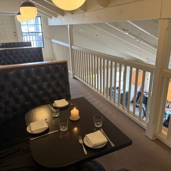 Stokes Adobe - Upstairs seating overlooking the bar on the right. - New American Near Me - Monterey, California