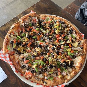 Milano Pizza - a large pizza with various toppings - Pizza Near Me - Sacramento, California Milano Pizza - a large pizza with various toppings - Pizza Near Me - Sacramento, California