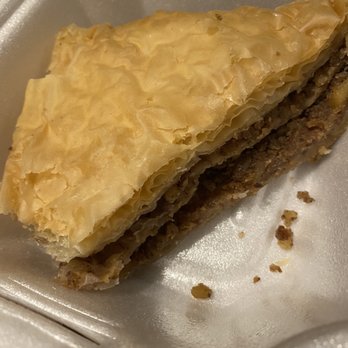 Elm Street Pizza - a piece of pie on a styrofoam container - Pizza Near Me - Woonsocket, Rhode Island