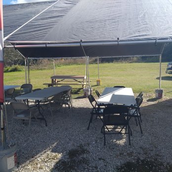 Taqueria El Palmar - tables and chairs under a tent - Food Trucks Near Me Taqueria El Palmar - tables and chairs under a tent - Food Trucks Near Me