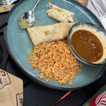 Mama Canela - Half of the first taco eaten. - Tex-Mex Near Me - Glendora, California