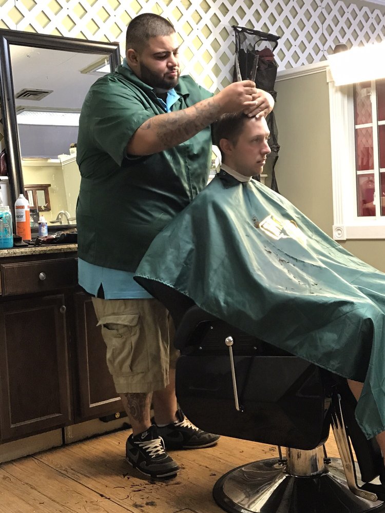 The Mom and Pop Barbershop Logo
