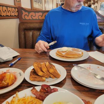 Solvang Restaurant - Eggs and pancakes for him and for me poached eggs with bacon crispy hashbrowns and toast ordered well done! - Scandinavian Near Me - Solvang, California Solvang Restaurant - Eggs and pancakes for him and for me poached eggs with bacon crispy hashbrowns and toast ordered well done! - Scandinavian Near Me - Solvang, California