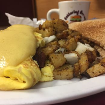 Gathering Ground - THE BENNY OMELETTE. corned beef hash with hollandaise sauce and it comes with a side of homefries and toast. - Breakfast & Brunch Near Me - Windsor Locks, Connecticut Gathering Ground - THE BENNY OMELETTE. corned beef hash with hollandaise sauce and it comes with a side of homefries and toast. - Breakfast & Brunch Near Me - Windsor Locks, Connecticut