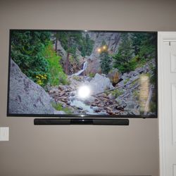 Hangman Services - TV and sound bar mounting with wire management