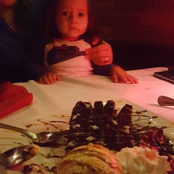 Clearman's Steak 'N Stein - My boy enjoying the 7 layered chocolate cake - Steakhouses Near Me - Pico Rivera, California