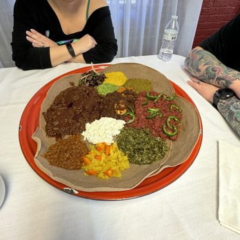 Lalibela Ethiopian Restaurant - Combo (veg meat) platter, also Kitfo , Key Wat we added onto the combo - Ethiopian Near Me - Omaha, Nebraska Lalibela Ethiopian Restaurant - Combo (veg meat) platter, also Kitfo , Key Wat we added onto the combo - Ethiopian Near Me - Omaha, Nebraska