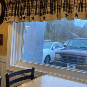 Diner 22 - a view of a car parked in a parking lot through a window - Diners Near Me - Alexandria, Pennsylvania