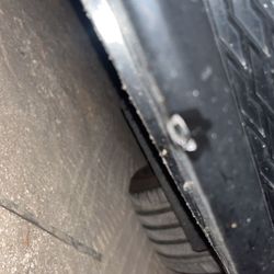 H&D Roadhouse - Damage from the rebar in their parking lot. It is exposed about and inch or 2 above the parking block