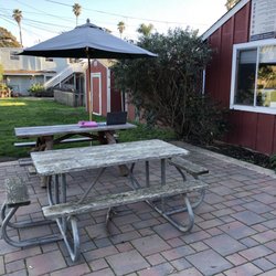 La Selva Beach Library - It's not swanky but you can work outside on the patio. WiFi is great out back at these wooden tables.