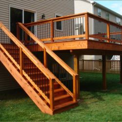Bradt Contracting - 16x16 raised deck with aluminum spindles.