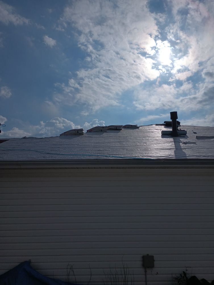 Slide of T & R Roofing