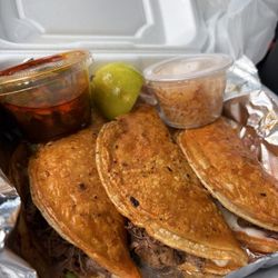 Agave Azul - Birria tacos served with rice, broth, salsa, chips $14.99