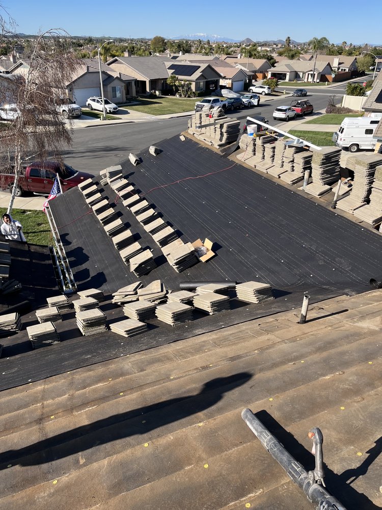 Slide of Nunez Roofing