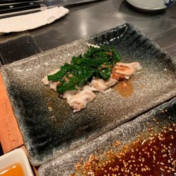 Sapporo TeppanYaki & Sushi Japans Restaurant - Flunder with shoulder parts bok choy and garlic soy sauce.