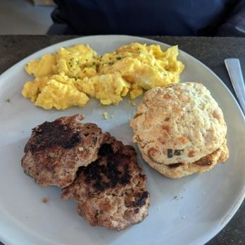 Cheeky's - Custard cheesy eggs with cheddar scone and sausage - Breakfast & Brunch Near Me - Palm Springs, California Cheeky's - Custard cheesy eggs with cheddar scone and sausage - Breakfast & Brunch Near Me - Palm Springs, California