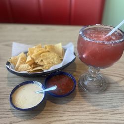 Louie's Grill - Raspberry Margarita, queso dip and salsa.