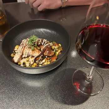 Juniper - Octopus and corn starter plus some red wine - New American Near Me - Greenville, South Carolina Juniper - Octopus and corn starter plus some red wine - New American Near Me - Greenville, South Carolina