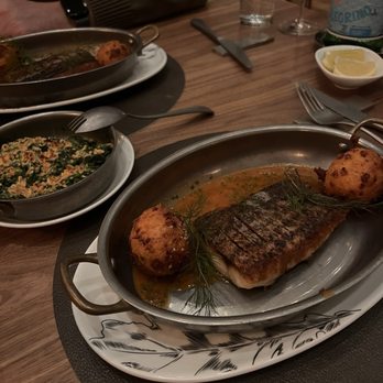 Wye Oak Tavern - Rockfish with hush puppies and creamed spinach - Bars Near Me - Frederick, Maryland Wye Oak Tavern - Rockfish with hush puppies and creamed spinach - Bars Near Me - Frederick, Maryland