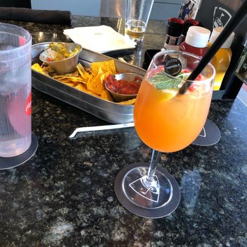 Topgolf - Aviation sangria & guacamole with chips - New American Near Me - Tampa, Florida Topgolf - Aviation sangria & guacamole with chips - New American Near Me - Tampa, Florida