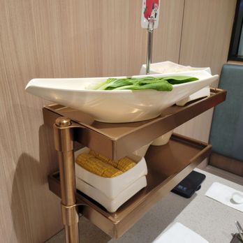Haidilao Hotpot Katy - Side shelf for veggies/sides. (Our Bok choy and corn) - Seafood Near Me - Katy, Texas Haidilao Hotpot Katy - Side shelf for veggies/sides. (Our Bok choy and corn) - Seafood Near Me - Katy, Texas