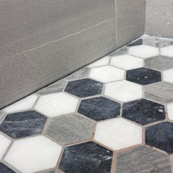 The Tile Shop - Shower floor meets shower wall