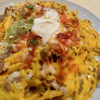Los Guerreros Mexican Restaurant - Super chicken nachos-- we started to dig in before I was able to snap a pic. - Mexican Near Me - North Bend, Oregon Los Guerreros Mexican Restaurant - Super chicken nachos-- we started to dig in before I was able to snap a pic. - Mexican Near Me - North Bend, Oregon