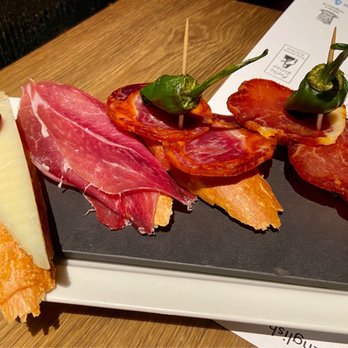 Ciutat Comtal - Surtido Ibérico Montaditos: Idiazabal cheese, jamon, chorizo, loin - Tapas Bars Near Me - Barcelona, B