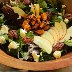 The Gaines Estate - Fall Harvest Salad - Mixed greens topped with slivered apples, candied pecan, shallots, roasted sweet potato, goat cheese and house dressing