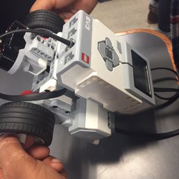 Assembling as robot car as a team. Assembling as robot car as a team.